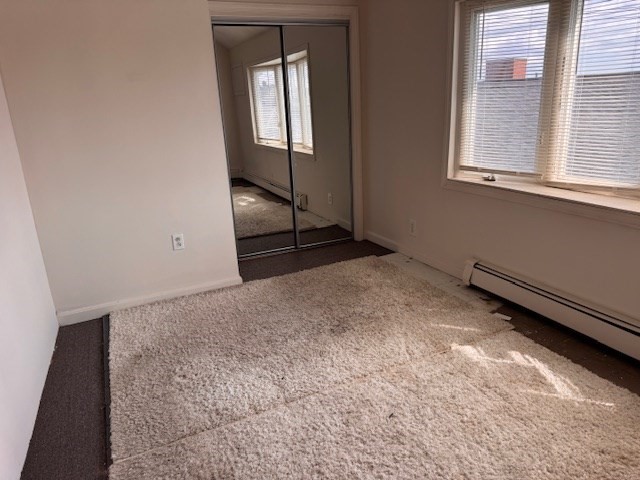 14 Dane Street, Unit 3 Everett, MA 02149 - Photo 8 of 19 an empty room with windows