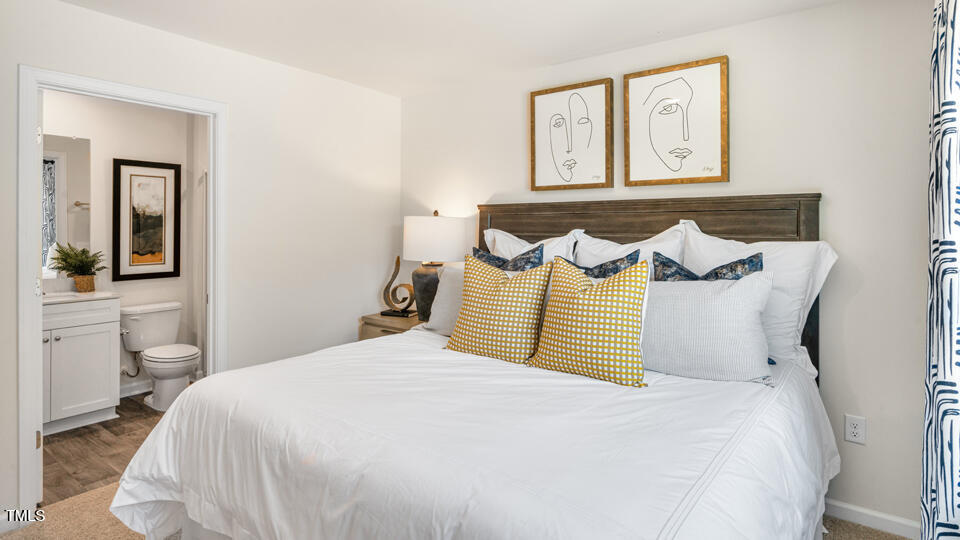 8510 Beckett Chase Way Raleigh, NC 27616 - Photo 16 of 28 a bedroom with bed and window