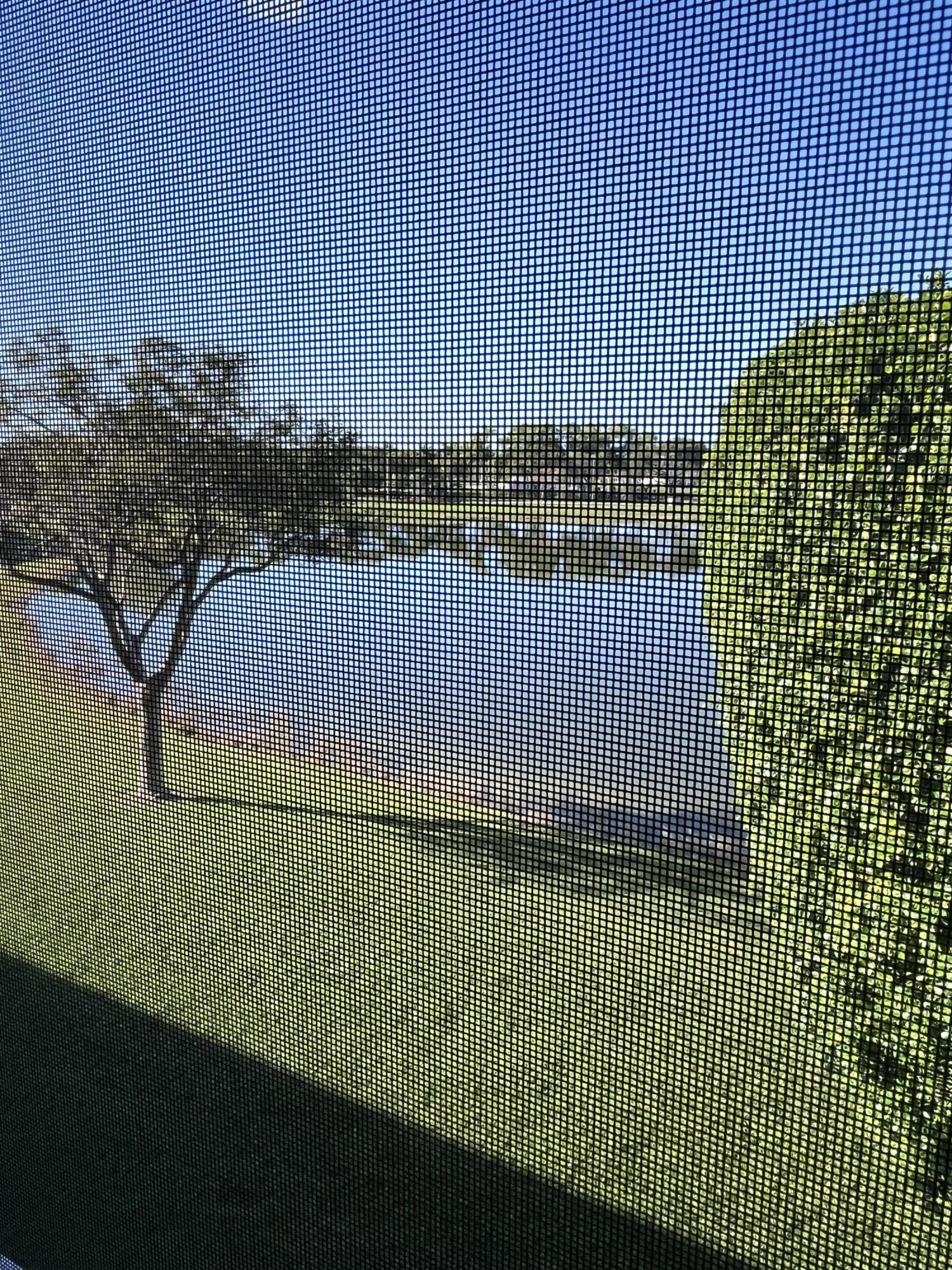 3081 Cornwall East Boca Raton, FL 33434 - Photo 16 of 16 a view of a tennis court