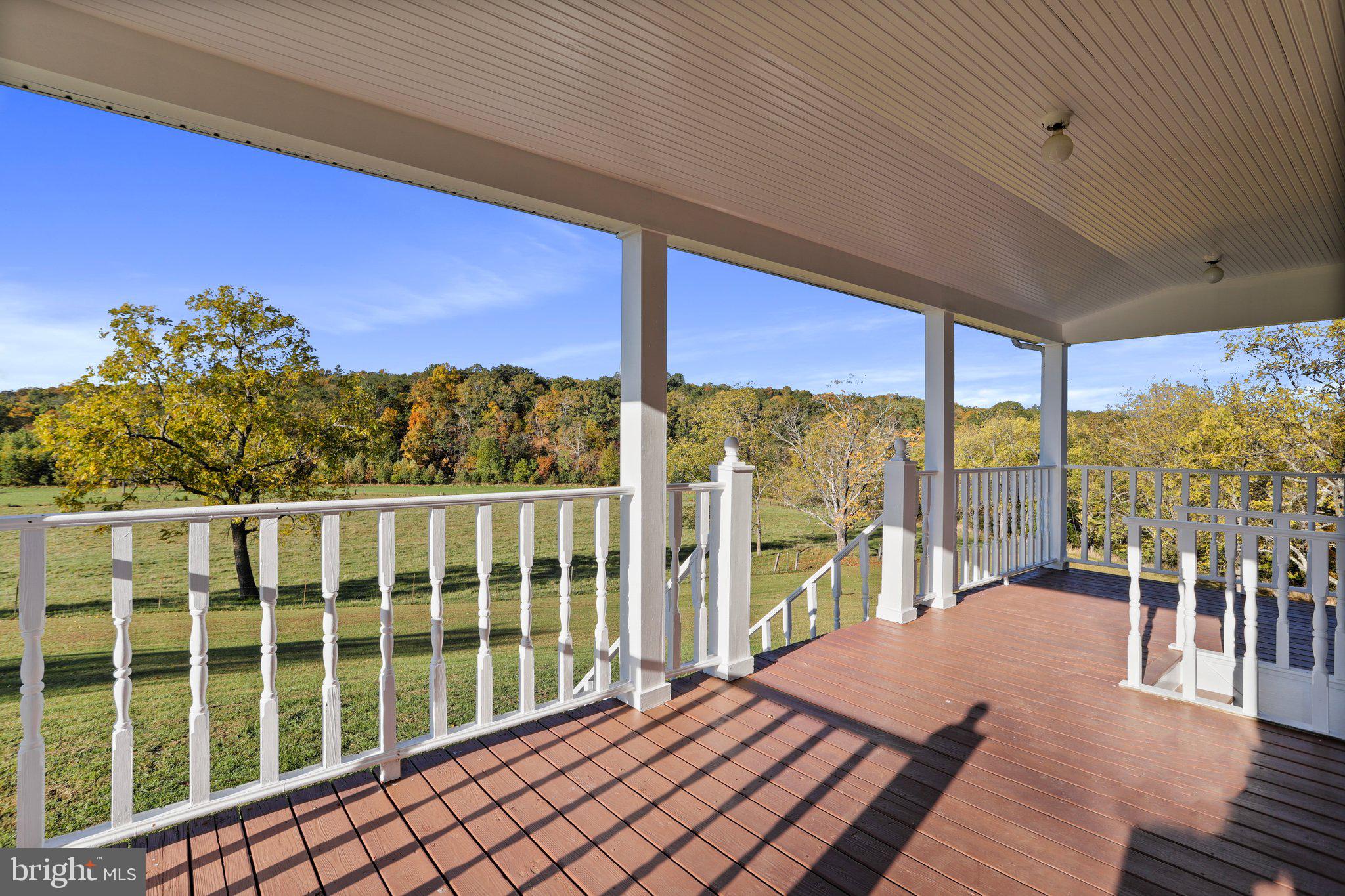 4942 Johnsons Mill Road Berkeley Springs, WV 25411 - Photo 55 of 99 Front porch overlooking the beautiful land