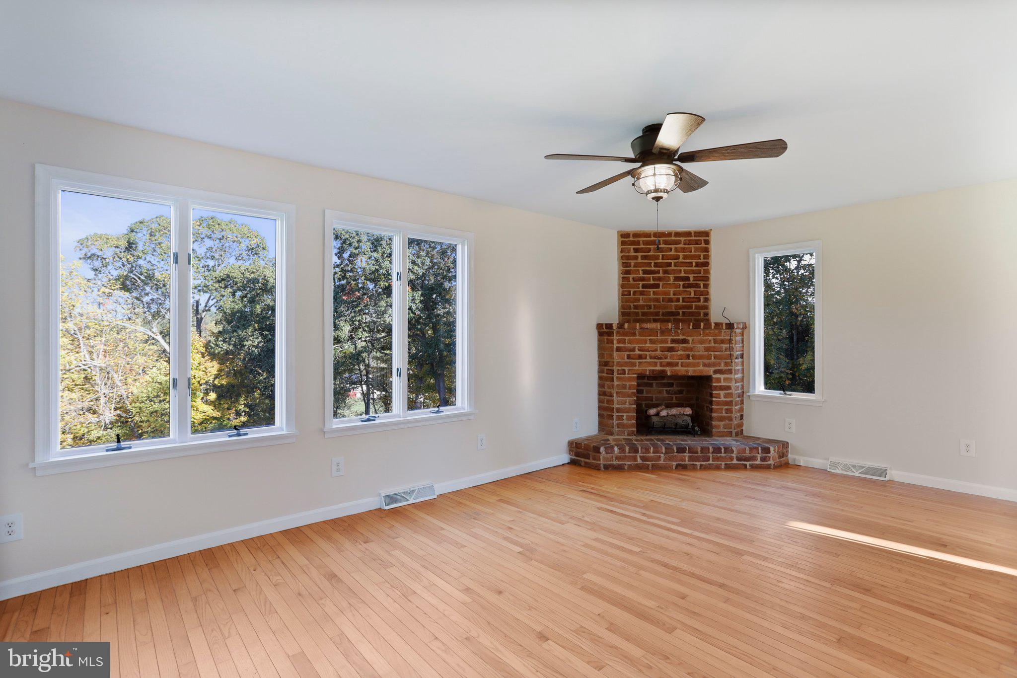 4942 Johnsons Mill Road Berkeley Springs, WV 25411 - Photo 58 of 99 Living room & gas fireplace