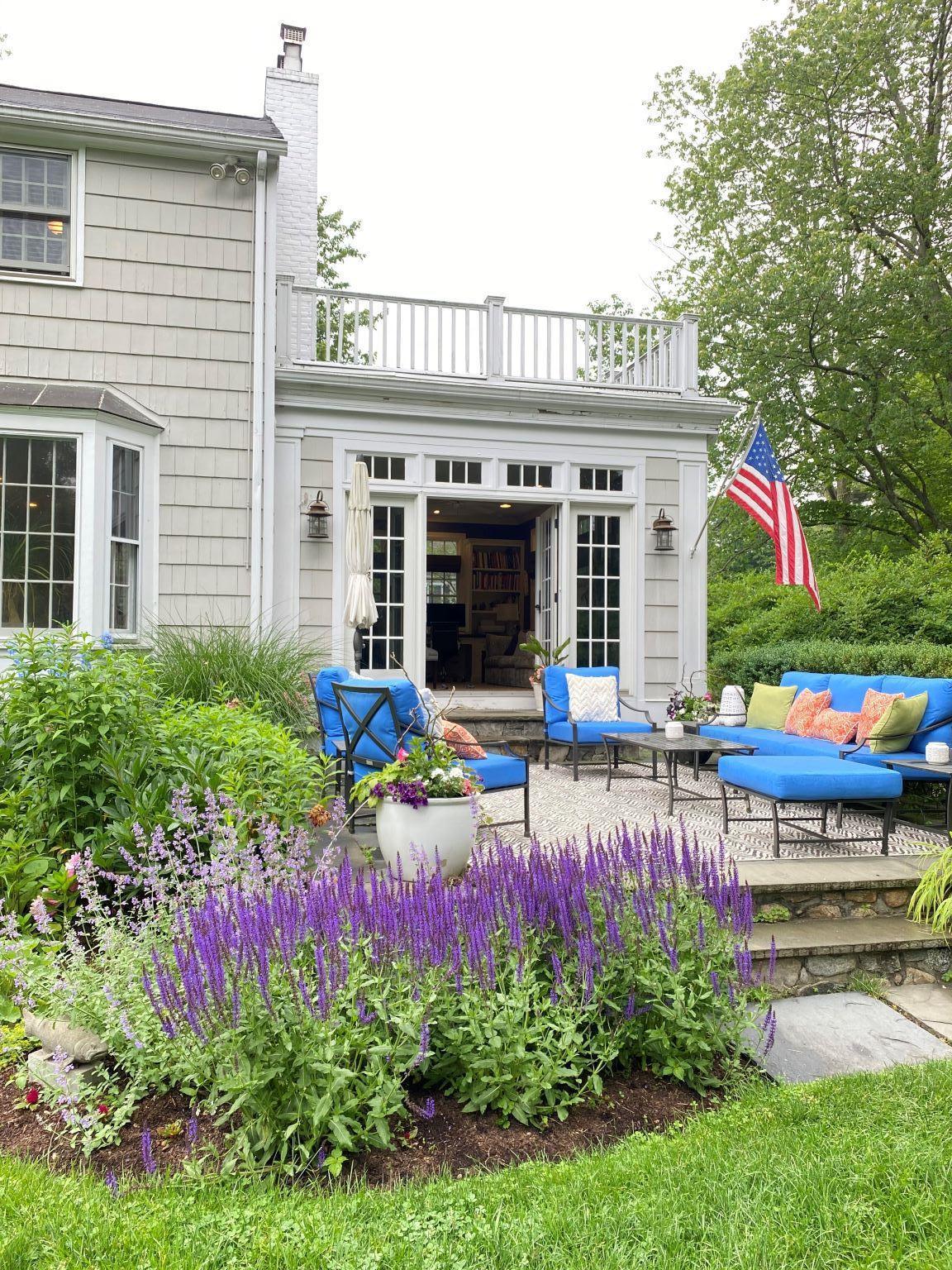 65 Conrad Road New Canaan, CT 06840 - Photo 11 of 12 a view of a house with patio