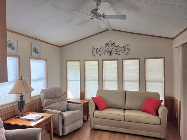 a kitchen with a refrigerator and a sink