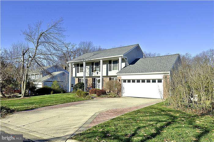 2204 Countryside Drive Silver Spring, MD 20905 - Photo 1 of 29 a front view of residential houses with yard and trees