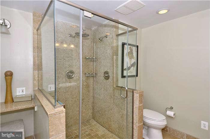 2204 Countryside Drive Silver Spring, MD 20905 - Photo 19 of 29 a bathroom with a shower and toilet