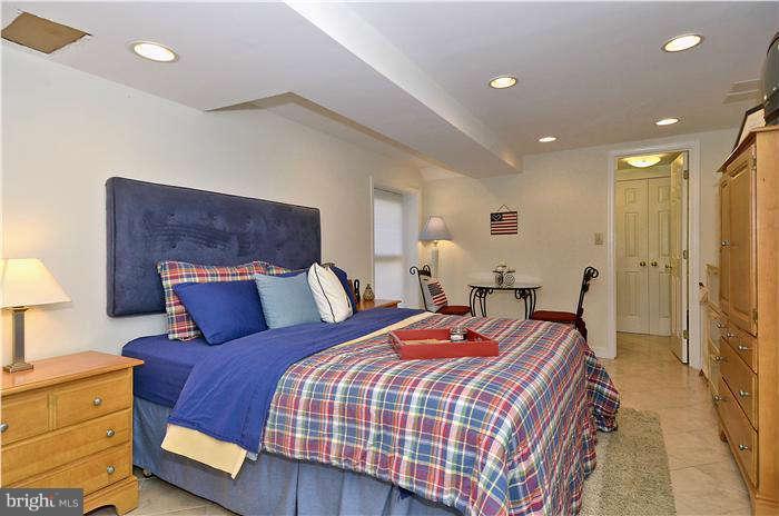 2204 Countryside Drive Silver Spring, MD 20905 - Photo 25 of 29 a bedroom with bed and a dresser
