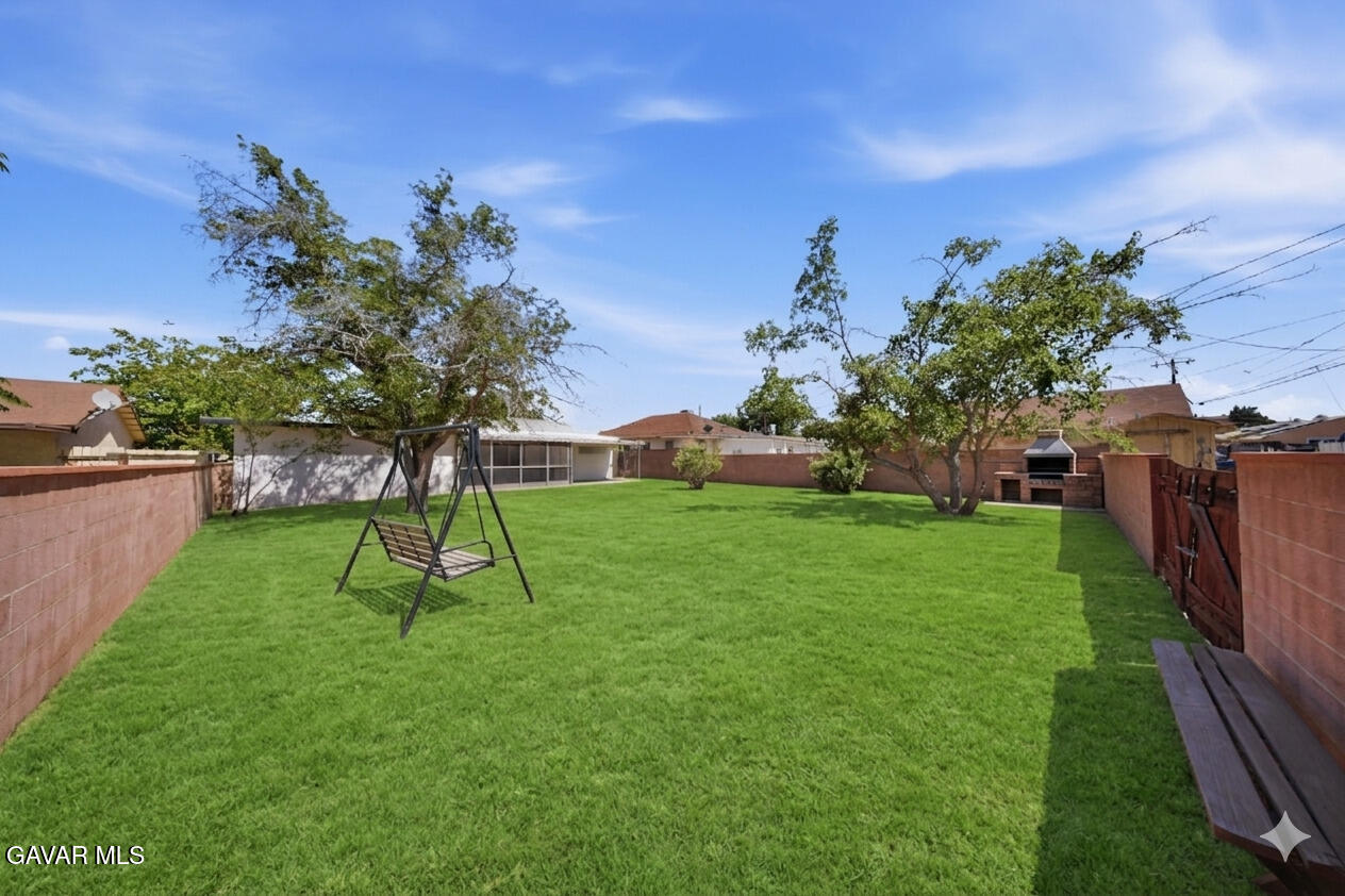 44515 Date Avenue Lancaster, CA 93534 - Photo 25 of 26 Backyard 2 staged