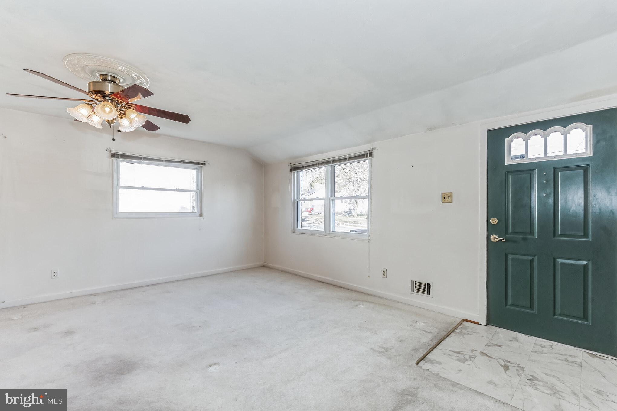 12812 Holdridge Road Silver Spring, MD 20906 - Photo 4 of 30 Living room and front door