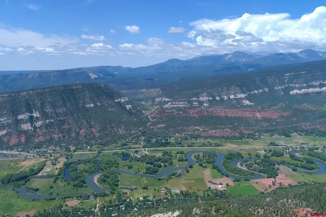 a view of lake with green space