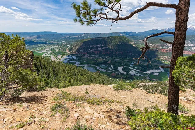 a view of a lake with mountains in the background