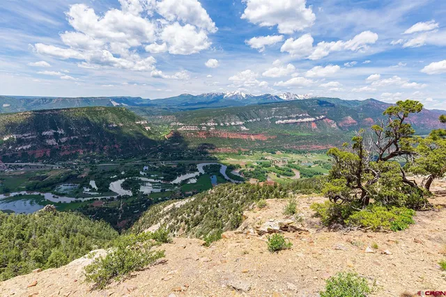 a view of a lake with a mountain