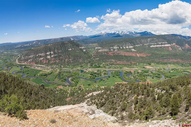 a view of a lake with a mountain
