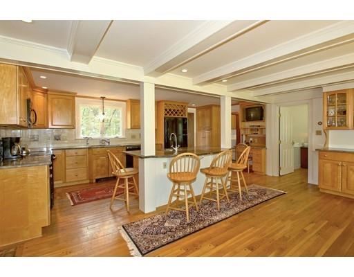 30 Decatur Lane Wayland, MA 01778 - Photo 13 of 29 a living room with dining room and wooden floor