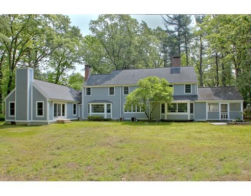 30 Decatur Lane Wayland, MA 01778 - Photo 2 of 29 a front view of a house with a garden
