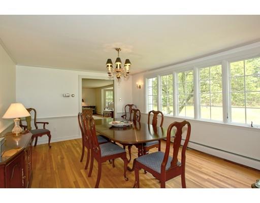 30 Decatur Lane Wayland, MA 01778 - Photo 7 of 29 a view of a dining room with furniture a chandelier and wooden floor