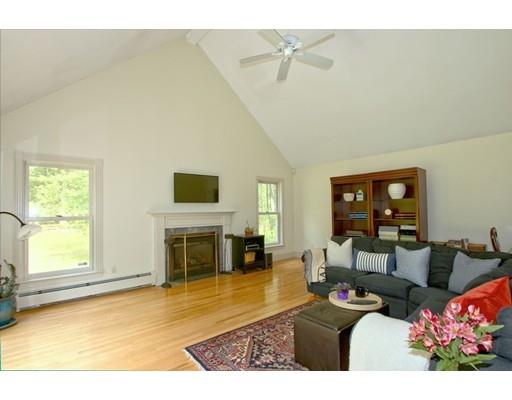 30 Decatur Lane Wayland, MA 01778 - Photo 8 of 29 a living room with furniture and a fireplace