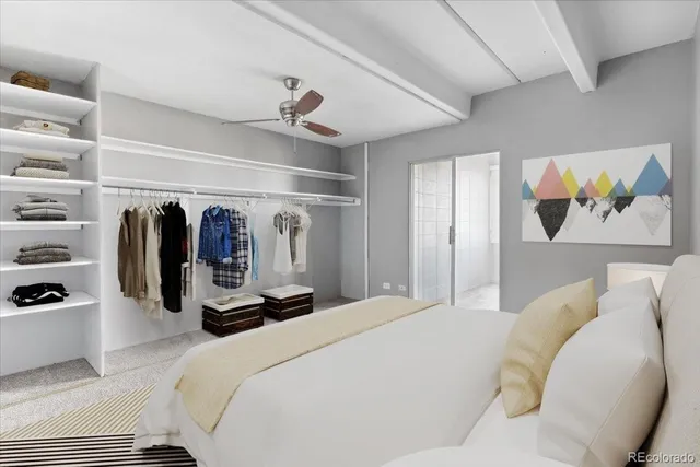 a bed room with a bed and a view of room