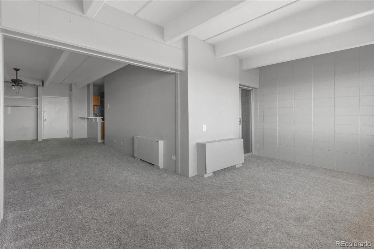 1888 South Jackson Street, Unit 604 Denver, CO 80210 - Photo 17 of 30 an empty room with a empty space