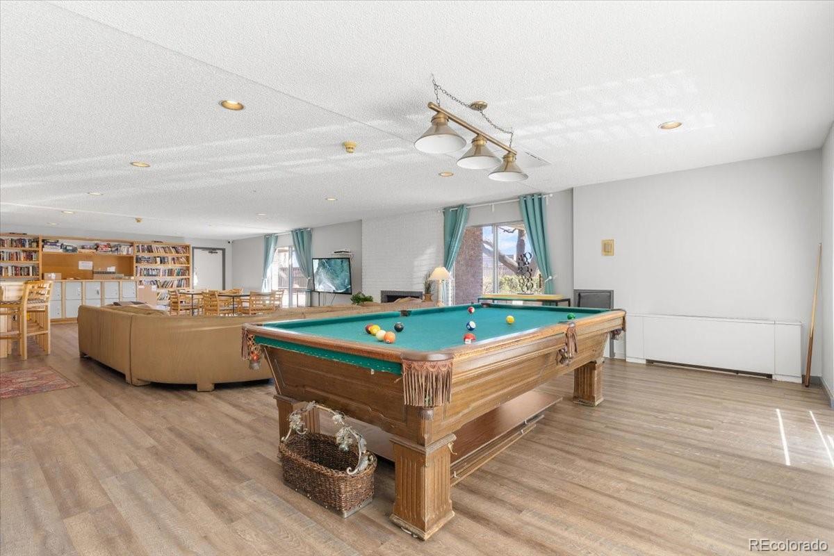 1888 South Jackson Street, Unit 604 Denver, CO 80210 - Photo 27 of 30 a room with pool table and windows
