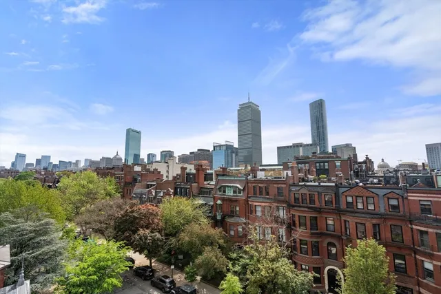 a view of a city with tall buildings