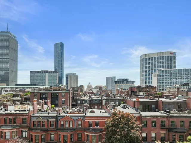 a city view with tall buildings