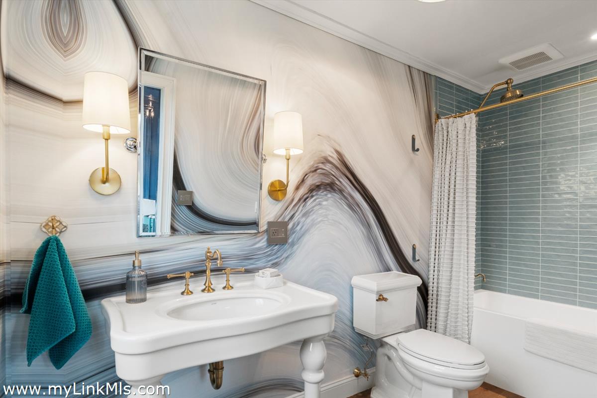 13 Parson Lane Nantucket, MA 02554 - Photo 10 of 44 a bathroom with a sink toilet and shower