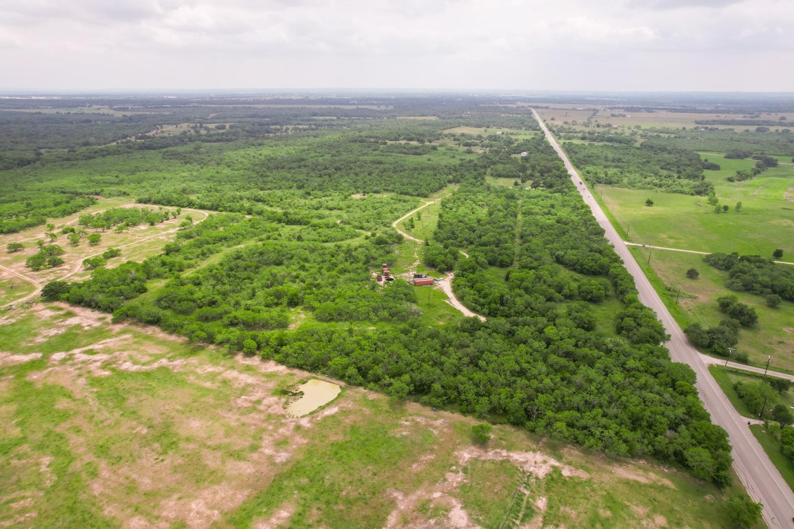 0 San Marcos Highway Luling, TX 78648 - Photo 12 of 35 a view of a lush green outdoor space with a lake view