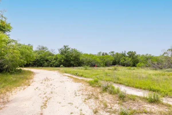 a view of a lake with a beach