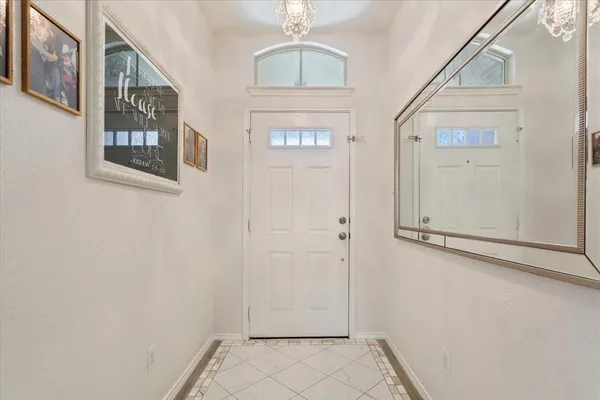 a view of a hallway with entryway
