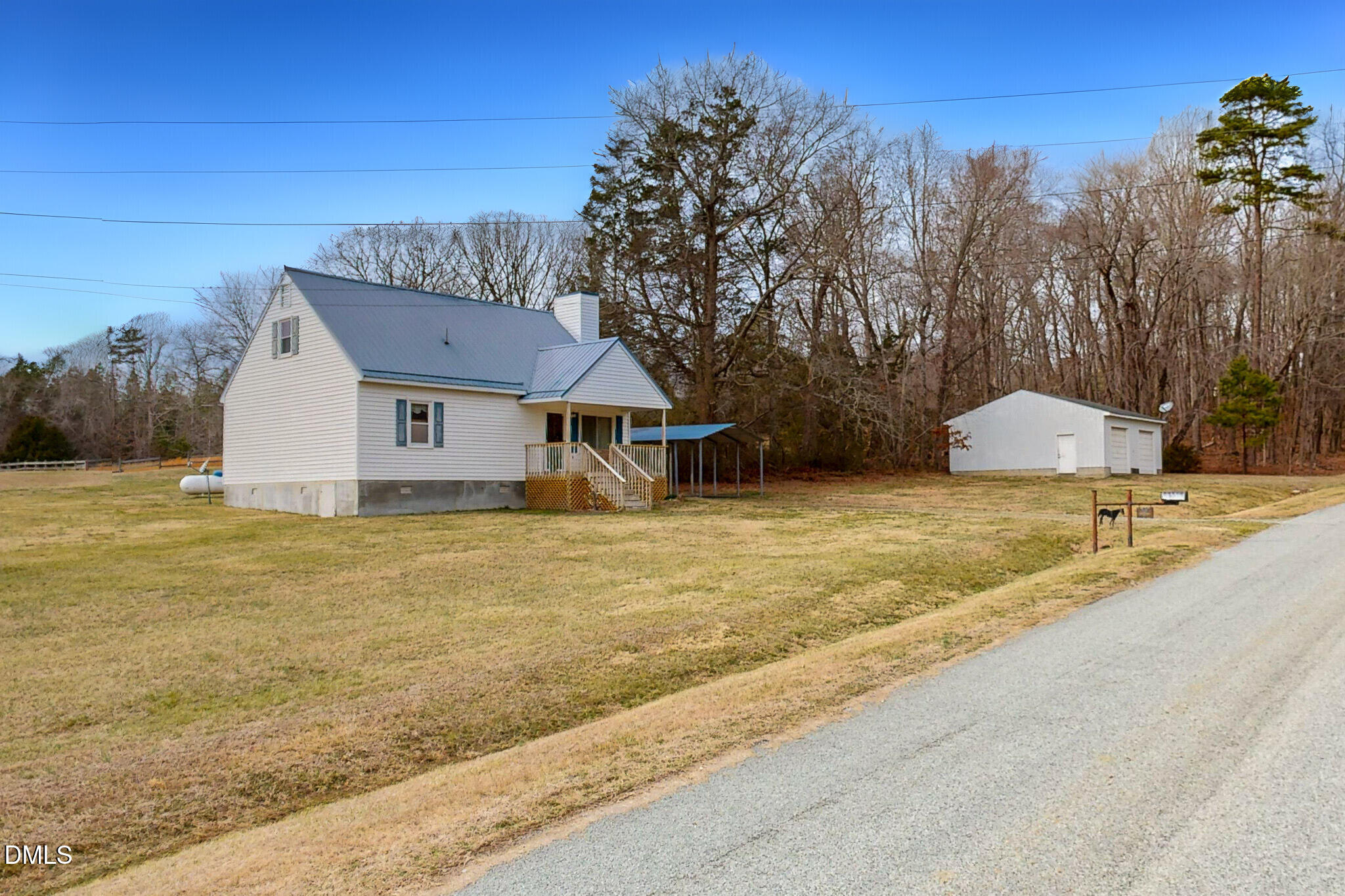 460 Medford Oakley Road Rougemont, NC 27572 - Photo 1 of 36 a aerial view of a house with swimming pool and sitting area