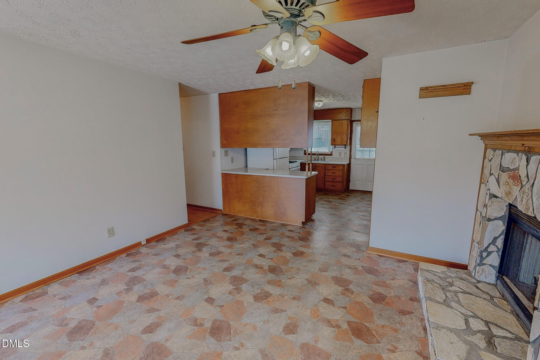 460 Medford Oakley Road Rougemont, NC 27572 - Photo 13 of 36 a living room with a couch and a flat screen tv