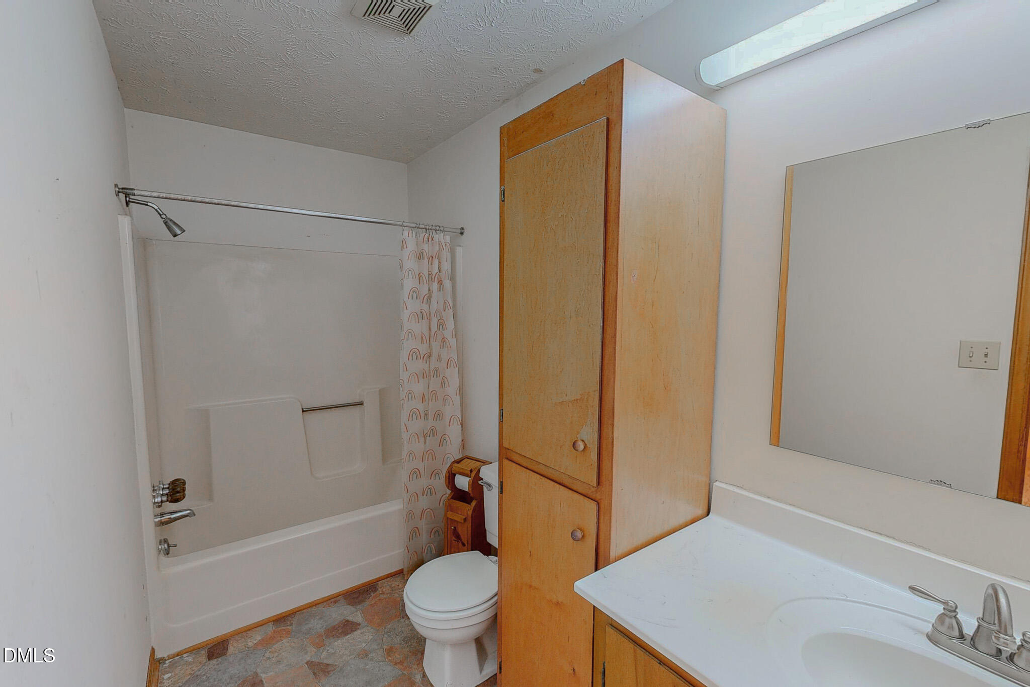 460 Medford Oakley Road Rougemont, NC 27572 - Photo 16 of 36 a bathroom with a sink toilet and shower