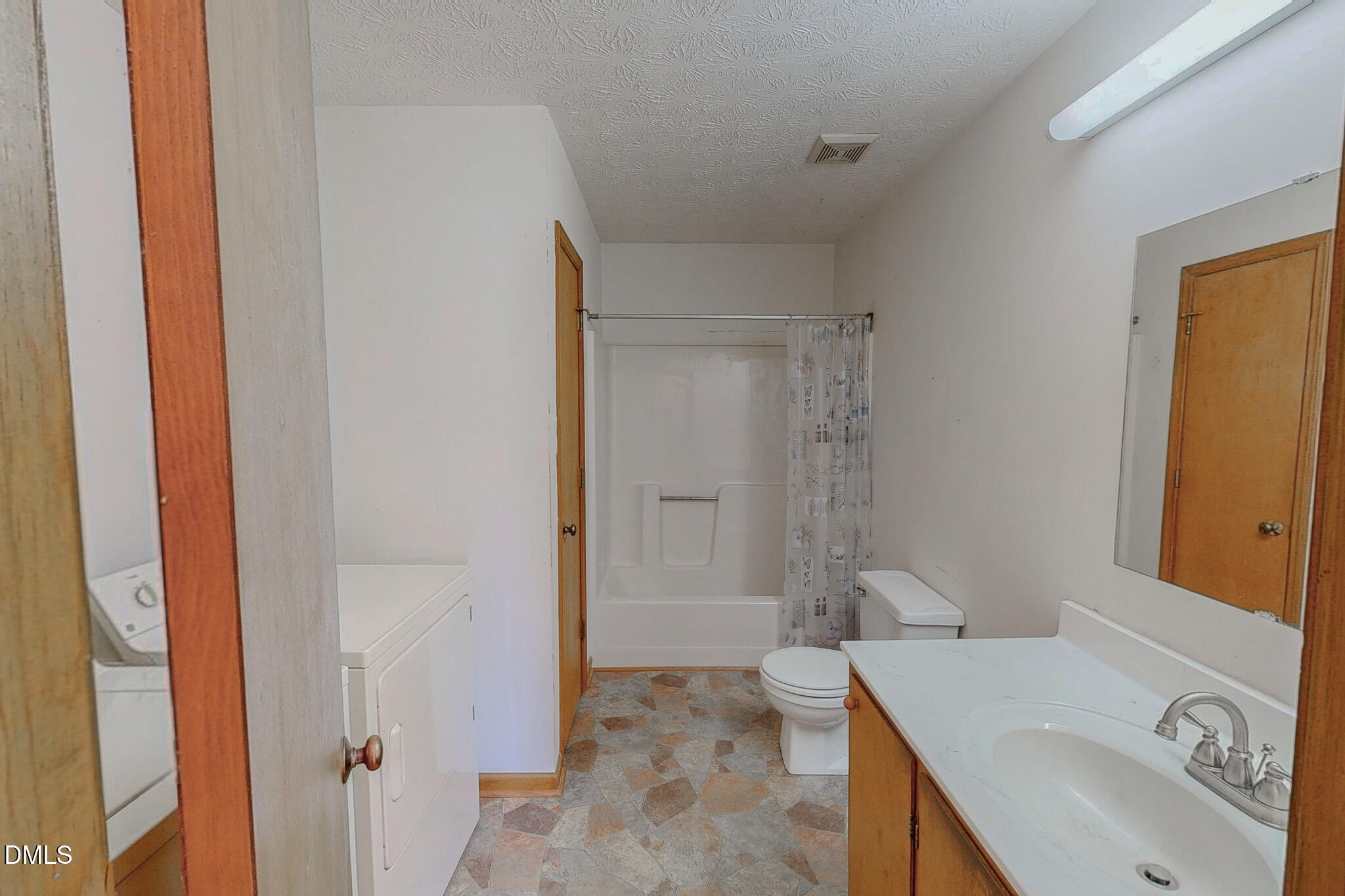 460 Medford Oakley Road Rougemont, NC 27572 - Photo 19 of 36 a bathroom with a sink and a mirror
