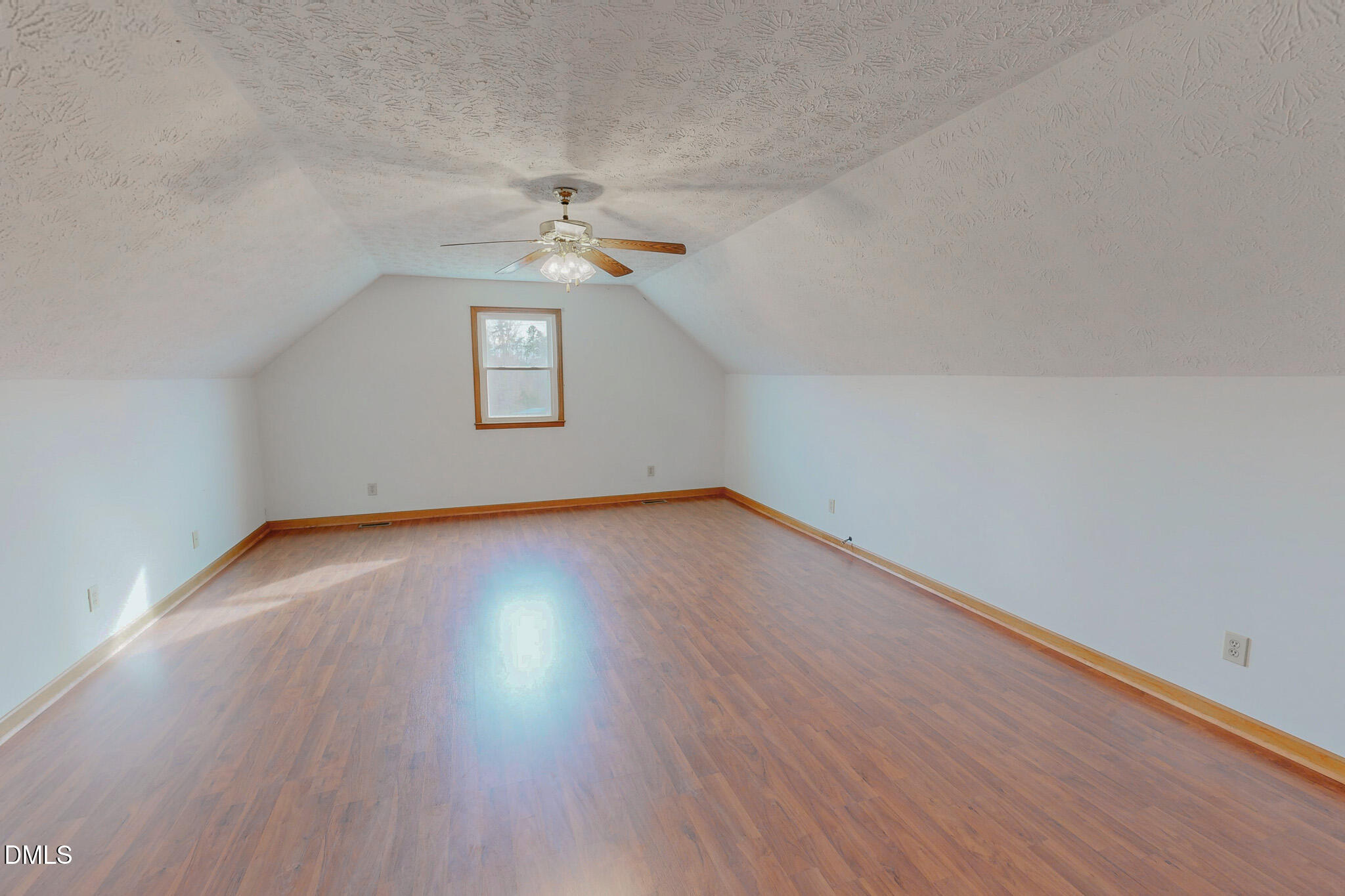 460 Medford Oakley Road Rougemont, NC 27572 - Photo 23 of 36 wooden floor in an empty room with a window