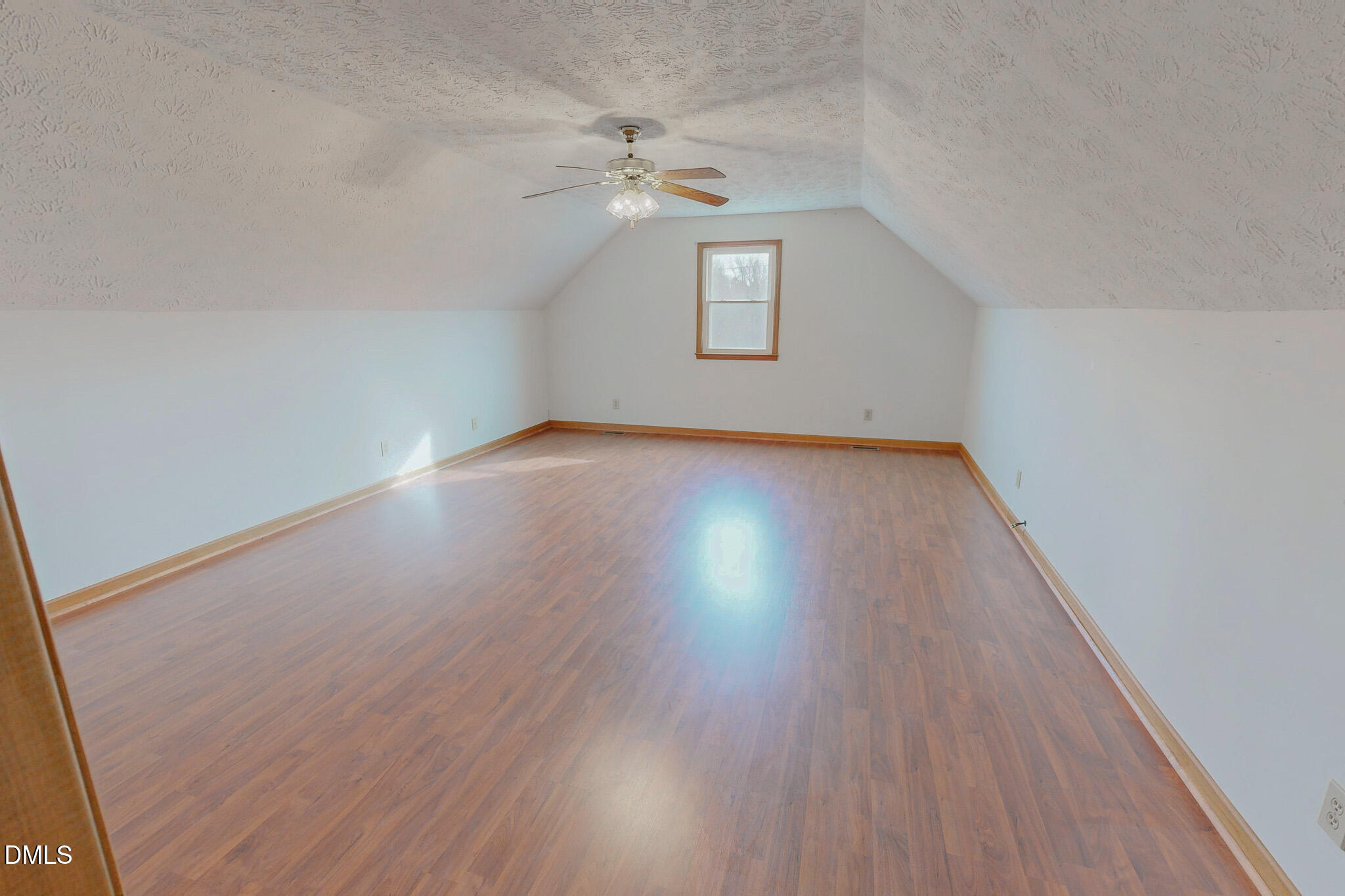 460 Medford Oakley Road Rougemont, NC 27572 - Photo 26 of 36 wooden floor in an empty room with a window