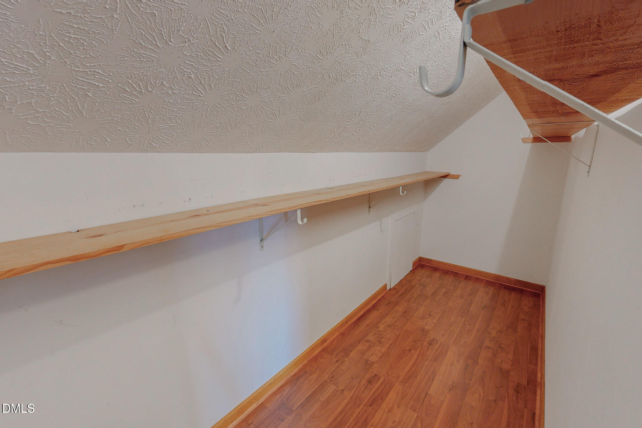 460 Medford Oakley Road Rougemont, NC 27572 - Photo 28 of 36 a view of a room with racks on the wall