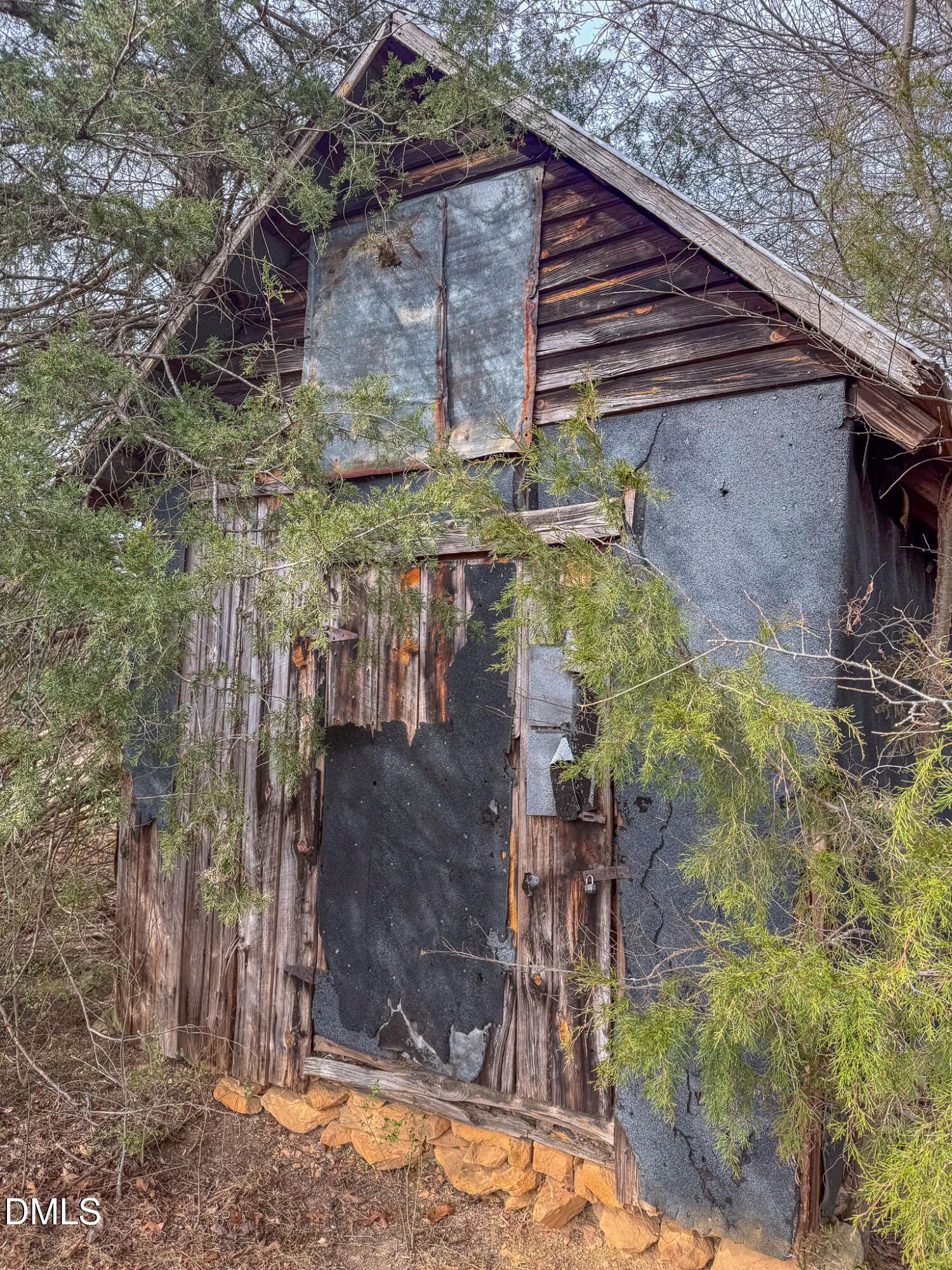 460 Medford Oakley Road Rougemont, NC 27572 - Photo 35 of 36 a yellow building with trees in front of it
