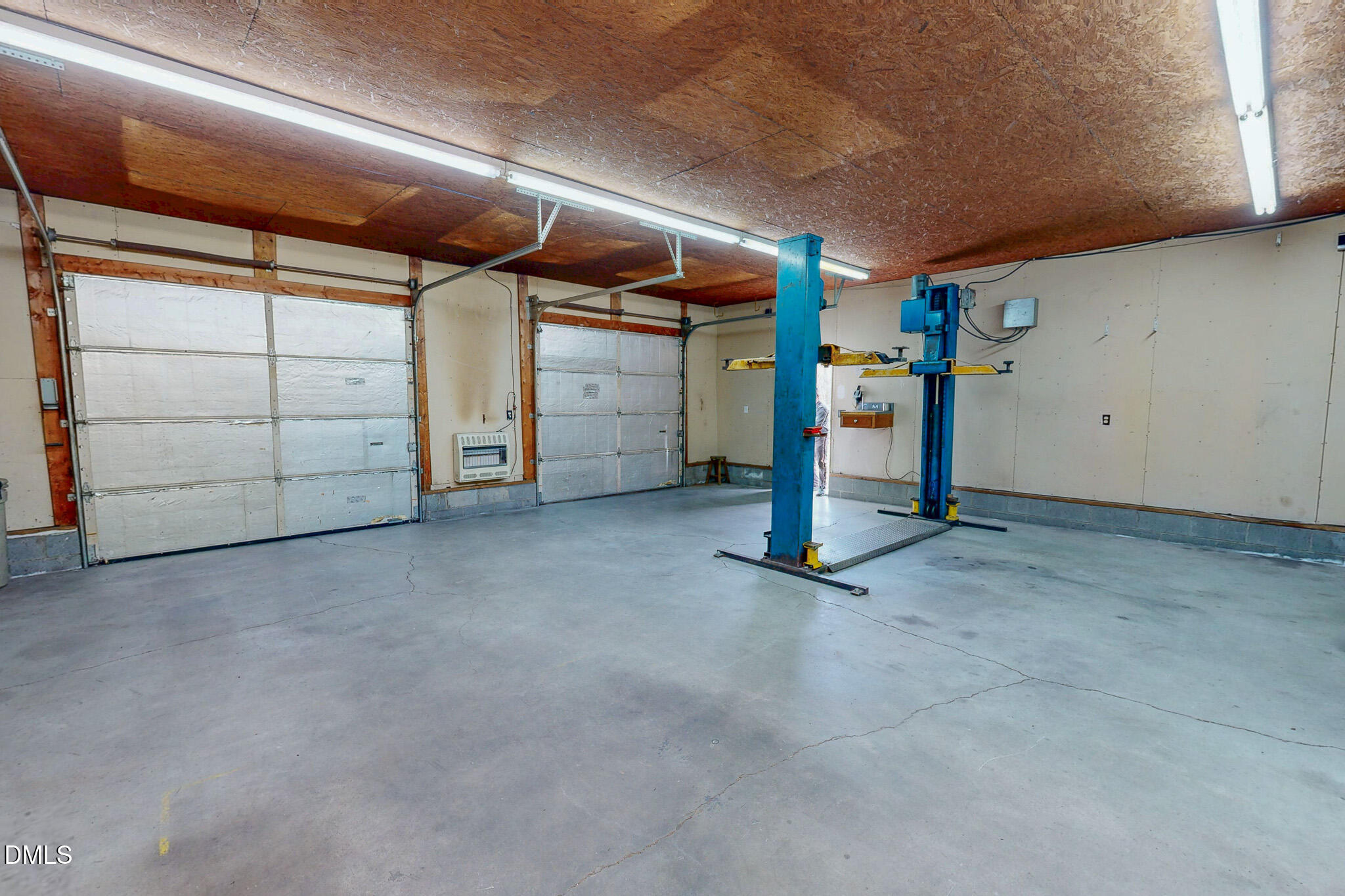 460 Medford Oakley Road Rougemont, NC 27572 - Photo 7 of 36 a view of a empty room with storage
