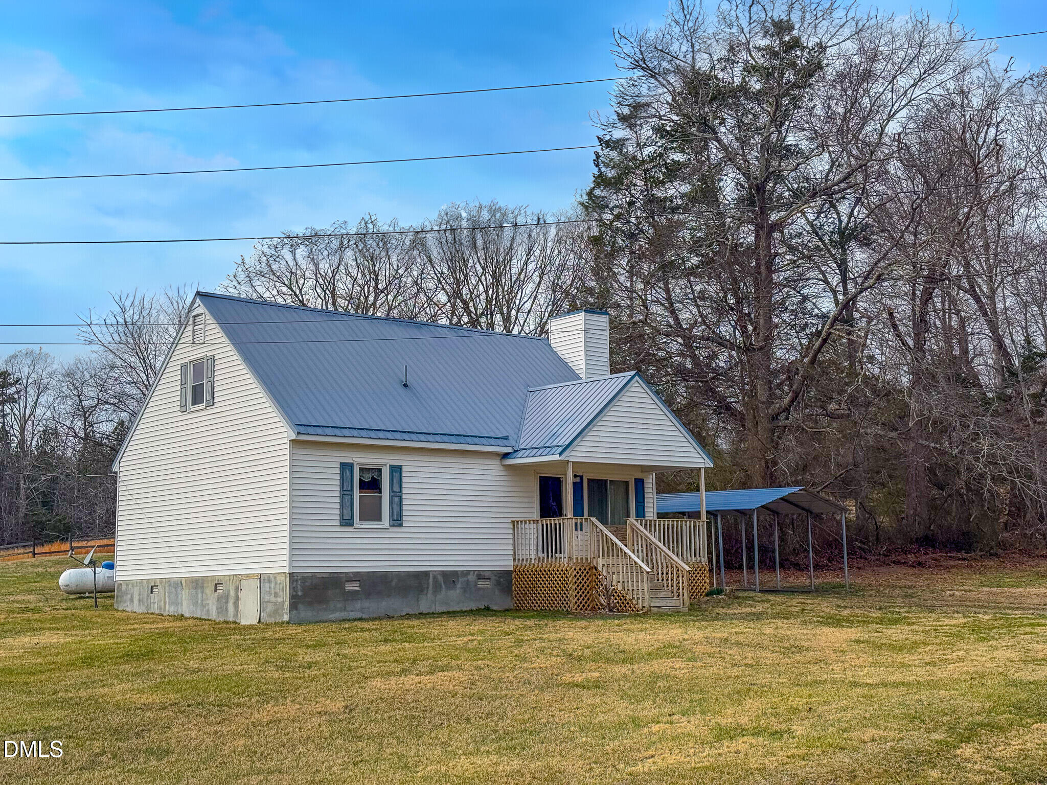 460 Medford Oakley Road Rougemont, NC 27572 - Photo 9 of 36 a front view of a house with a yard