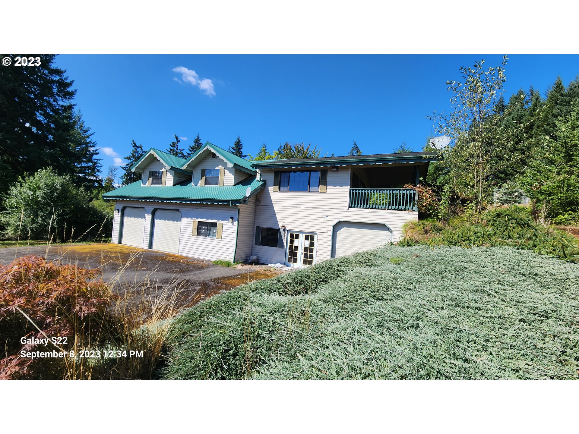 30827 Beaver Homes Road Rainier, OR 97048 - Photo 1 of 17 a view of a house with a yard