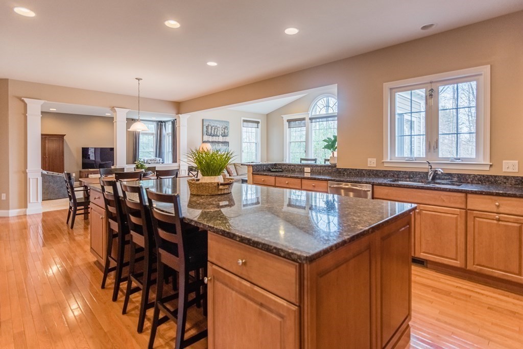 74 Canterbury Hill Road Acton, MA 01720 - Photo 11 of 37 a kitchen with granite countertop lots of counter top space and dining table
