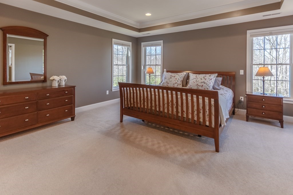 74 Canterbury Hill Road Acton, MA 01720 - Photo 22 of 37 a bed room with a bed and a window