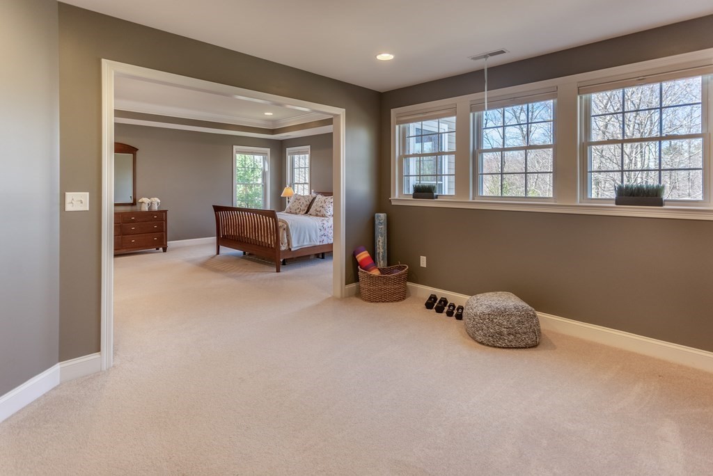 74 Canterbury Hill Road Acton, MA 01720 - Photo 24 of 37 a living room with furniture and a large window
