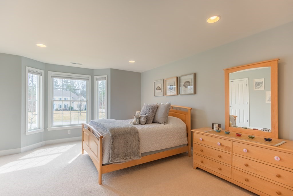 74 Canterbury Hill Road Acton, MA 01720 - Photo 28 of 37 a bed room with a bed and a window