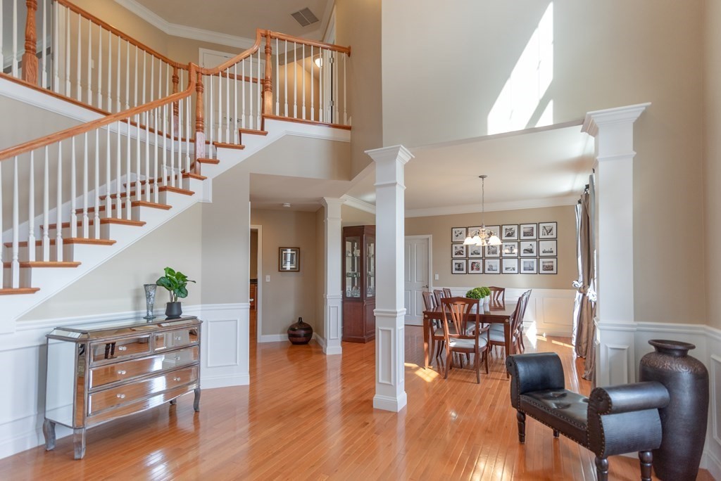 74 Canterbury Hill Road Acton, MA 01720 - Photo 3 of 37 a living room with furniture and a wooden floor