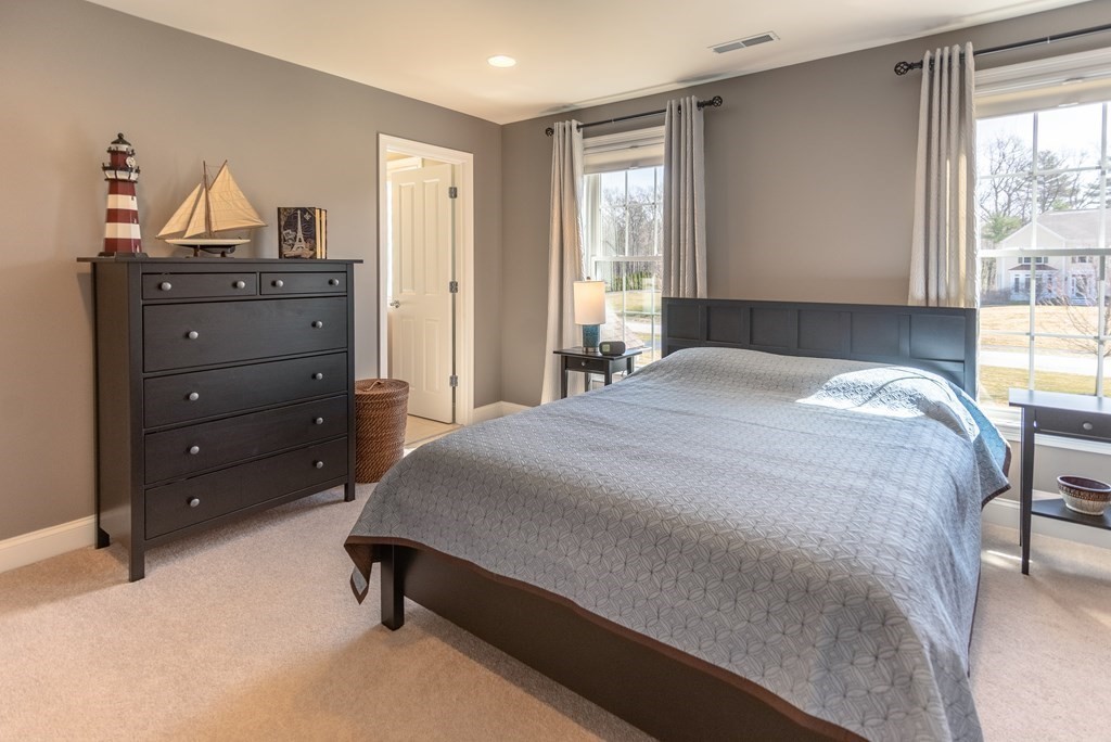 74 Canterbury Hill Road Acton, MA 01720 - Photo 33 of 37 a bedroom with a bed and window