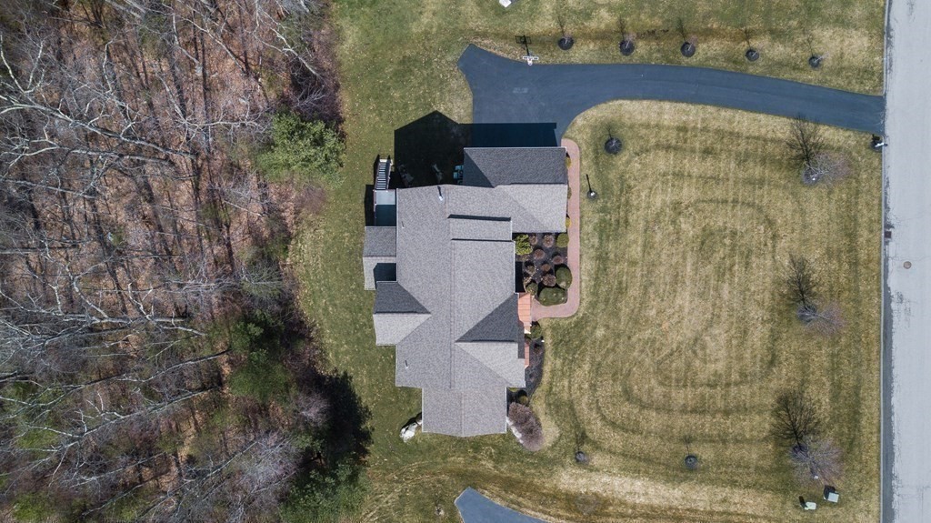 74 Canterbury Hill Road Acton, MA 01720 - Photo 37 of 37 an aerial view of a house with a yard