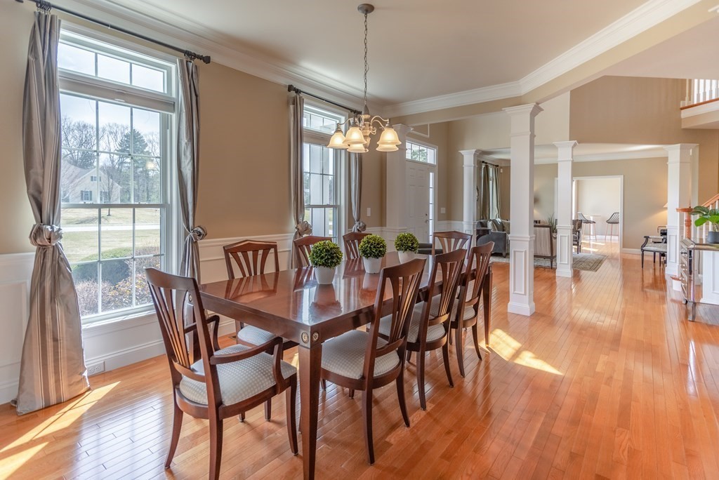 74 Canterbury Hill Road Acton, MA 01720 - Photo 4 of 37 a dining room with furniture window and wooden floor