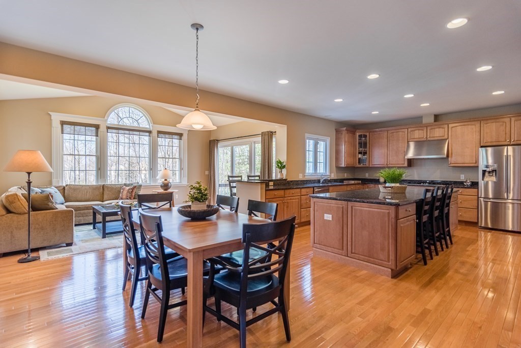 74 Canterbury Hill Road Acton, MA 01720 - Photo 9 of 37 a large kitchen with a table and chairs
