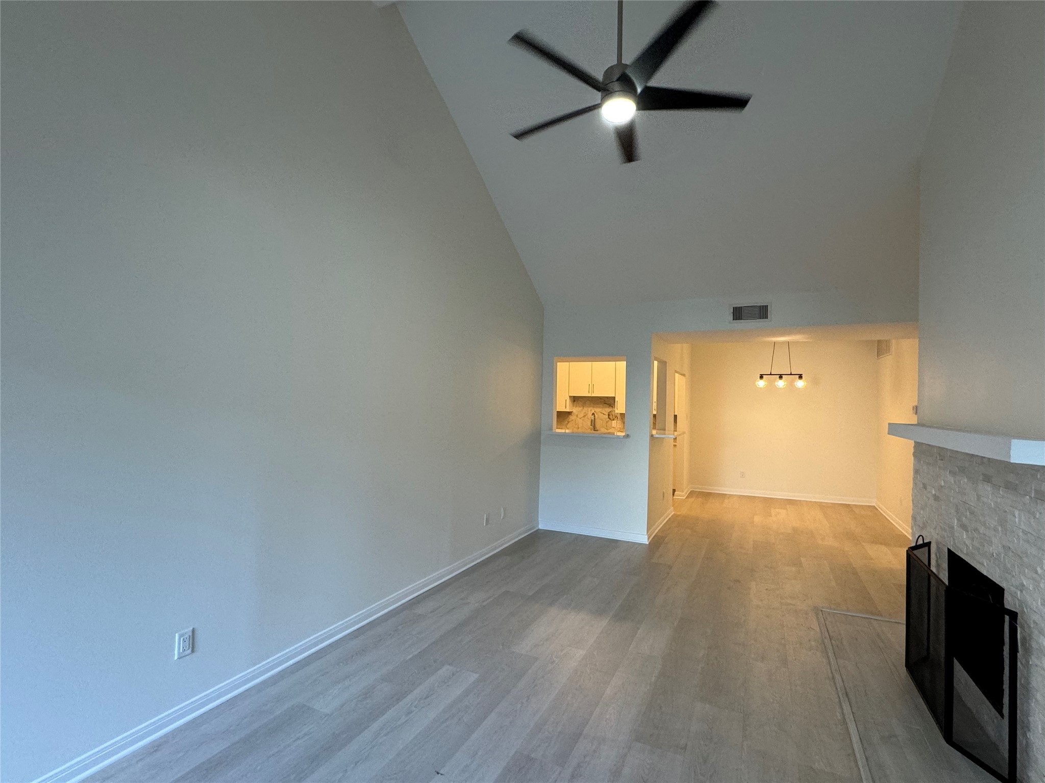 2100 Tanglewilde Street, Unit 626 Houston, TX 77063 - Photo 4 of 36 Living room featuring high ceiling, NEWLY remodeled from floor to ceiling